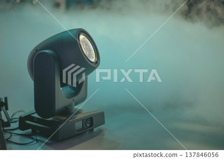 Professional Moving Head Stage Spotlight in Smoke with Large Copy Space Professional Moving Head Stage Spotlight in Smoke with Large Copy Space 137846056