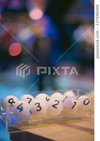 White Lottery Balls with Numbers in Transparent Case with Copy Space 137846089