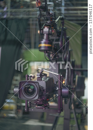 Professional TV Camera on Crane Shooting in Studio with Copy Space Professional TV Camera on Crane Shooting in Studio with Copy Space 137846117