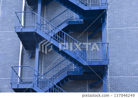 Blue, geometrically shaped fire escape 137846249