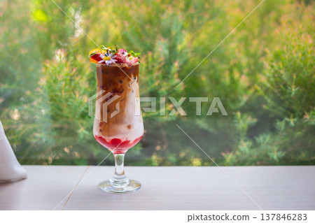 Chocolate coffee with milk and strawberries decorated with flowers, oranges and fresh strawberries on a beautiful wooden table. Copy space background Chocolate coffee with milk and strawberries decorated with flowers, oranges and fresh strawberries on a beautiful wooden table. Copy space background 137846283