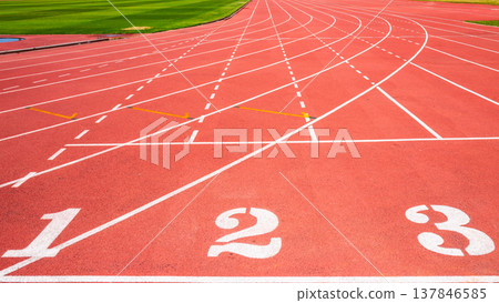 A running track with the numbers one, two, three and running lines on the field. A running track with the numbers one, two, three and running lines on the field. 137846585
