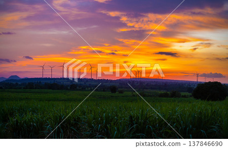 Landscape Panorama of Windmill on a mountain with vast meadows at sunset, beautifully illuminated. Landscape Panorama of Windmill on a mountain with vast meadows at sunset, beautifully illuminated. 137846690