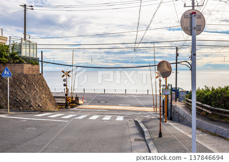 The Enoden Line with the sea as a background at Kamakura Kokomae station, one of the scenes in the anime Slamdunk, is a popular tourist attraction in Kamakura, Japan. 137846694