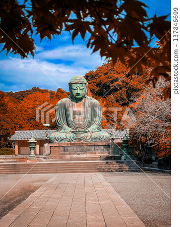 Daibutsu or Great Buddha of Kamakura in Kotokuin Temple at Kanagawa Prefecture Japan with red leaves changing color It is an important landmark and a popular destination for tourists and pilgrims. Daibutsu or Great Buddha of Kamakura in Kotokuin Temple at Kanagawa Prefecture Japan with red leaves changing color It is an important landmark and a popular destination for tourists and pilgrims. 137846699