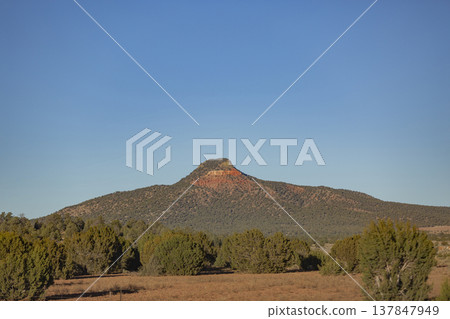 Red Butte Mountain in Arizona Desert Landscape with Power Lines and Copy Space Red Butte Mountain in Arizona Desert Landscape with Power Lines and Copy Space 137847949