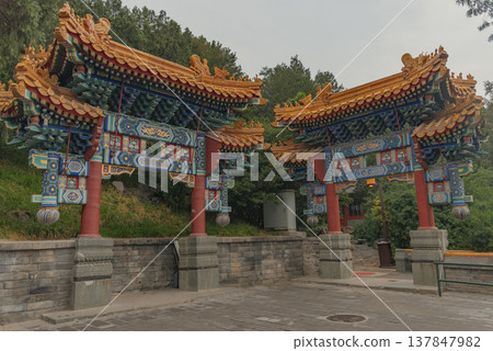 Two Imperial Chinese Gate Arches with Ornate Roofs in Beijing with copy space Two Imperial Chinese Gate Arches with Ornate Roofs in Beijing with copy space 137847982
