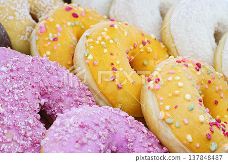 Assorted glazed donuts Assorted glazed donuts 137848487