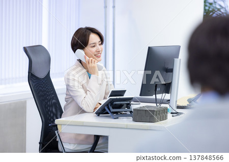Business woman working in office Business woman working in office 137848566