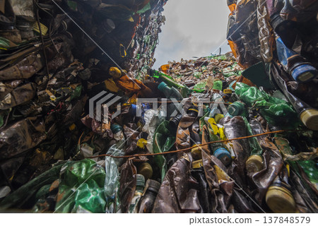 Environmental Textured Background with Deep Perspective Inside Compressed Plastic Bottles Environmental Textured Background with Deep Perspective Inside Compressed Plastic Bottles 137848579