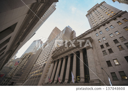 New York Stock Exchange NYSE Building with Skyscrapers and Sky Copy Space in Manhattan 137848608