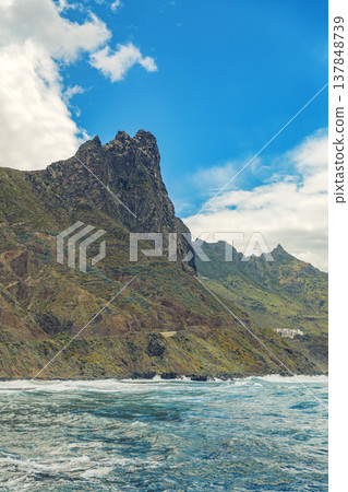 Majestic Roque de las Animas mountain peak on Tenerife northern coast with copy space in sky 137848739