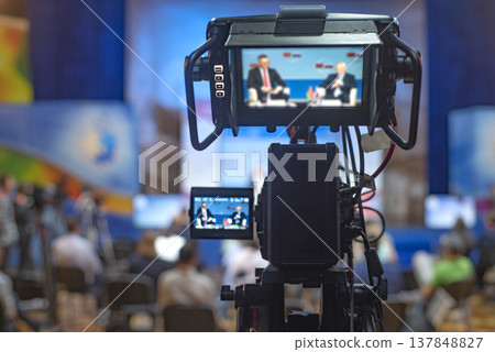 Professional Video Camera Screen Filming Live Discussion with Speakers and Copy Space for Media Concept 137848827
