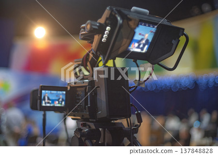 Professional Broadcast Video Camera Monitoring Live Event with Two Screens and Copy Space Professional Broadcast Video Camera Monitoring Live Event with Two Screens and Copy Space 137848828