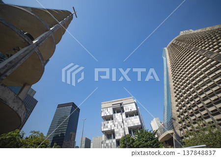 Modern Skyscrapers and Metropolitan Cathedral in Rio de Janeiro with Blue Sky Copy Space Modern Skyscrapers and Metropolitan Cathedral in Rio de Janeiro with Blue Sky Copy Space 137848837