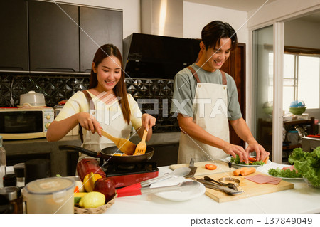 Asian couple at home Asian couple at home 137849049