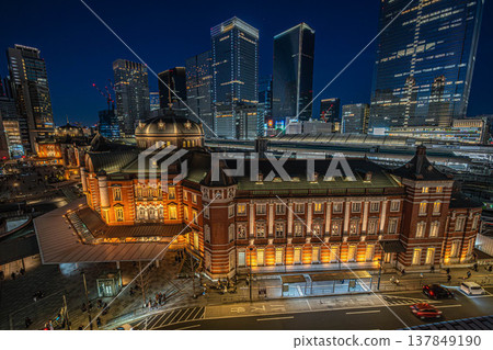 Night view of Tokyo Station's Marunouchi building and the cluster of skyscrapers in Yaesu [Marunouchi, Chiyoda-ku, Tokyo] 137849190