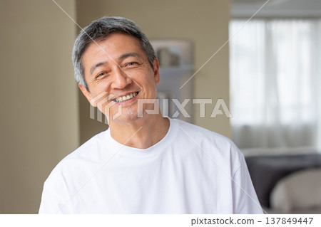 Smiling senior man relaxing Smiling senior man relaxing 137849447