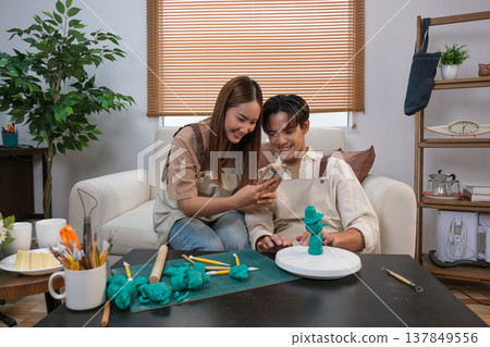A young Asian couple spend time together at home 137849556