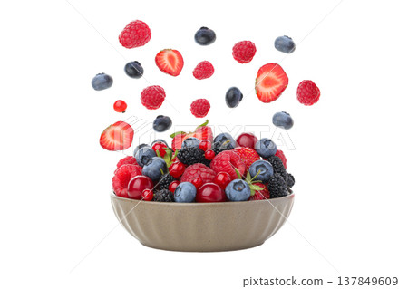 Bowl full of mixed berries with fruits flying around, PNG 137849609