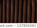 Dark brown ribbed knit texture background with vertical lines, textile close up 137850381