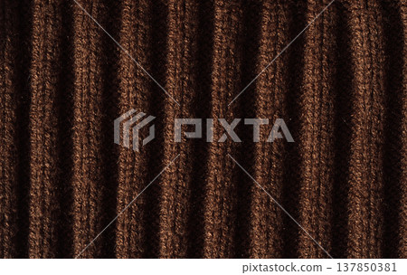 Dark brown ribbed knit texture background with vertical lines, textile close up Dark brown ribbed knit texture background with vertical lines, textile close up 137850381