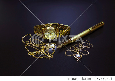 Luxury watches, fountain pens, jewelry, items containing gold. 137850801