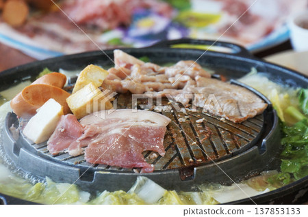 Sizzling Thai style BBQ tempting ready to be eaten. Sizzling Thai style BBQ tempting ready to be eaten. 137853133