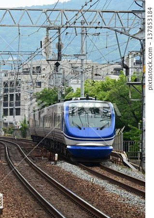 The Super Hakuto express train passes Sakura-Shukugawa Station on the quadruple-track Tokaido Main Line The Super Hakuto express train passes Sakura-Shukugawa Station on the quadruple-track Tokaido Main Line 137853184