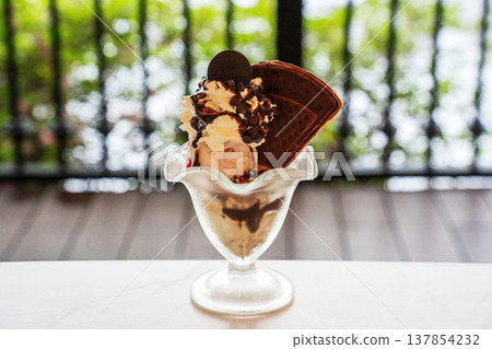 Chocolate sundae with river view Chocolate sundae with river view 137854232