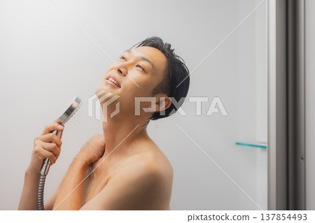 Men taking a shower 137854493