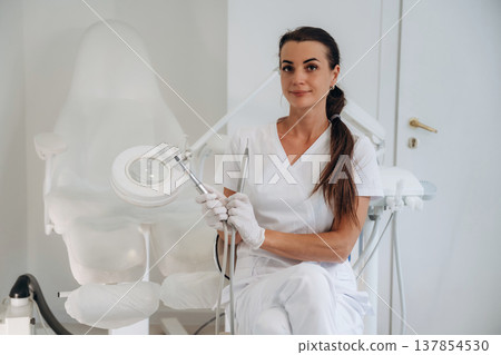 Ready for work. Podiatrist is in the clinic with equipment Ready for work. Podiatrist is in the clinic with equipment 137854530