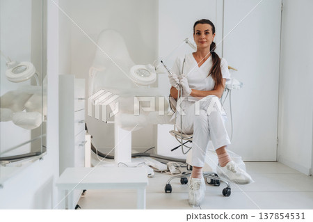 Ready for work. Podiatrist is in the clinic with equipment 137854531