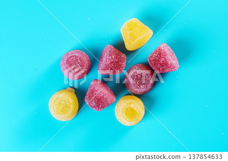 Red and yellow gummy candies Red and yellow gummy candies 137854633