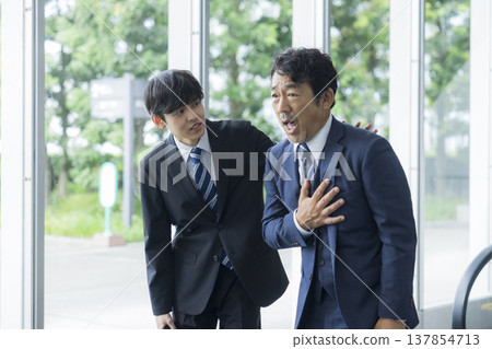 Businessman with poor physical condition Businessman with poor physical condition 137854713