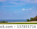 The refreshing blue skies and blue seas of the tropics, and the coral reefs and coral shores of Miyako Blue as viewed from the golf course (Miyako Island, Okinawa Prefecture) 137855716