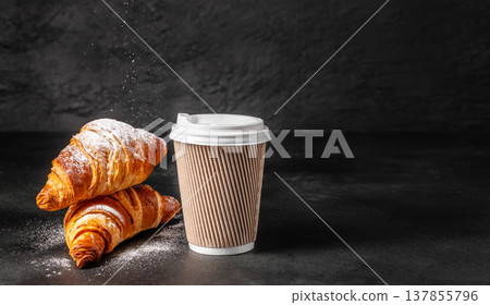 Croissants with Takeaway Coffee Cup on Dark Background 137855796