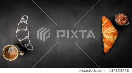 Croissant with Coffee and Chocolate Spread on Black Background 137855798
