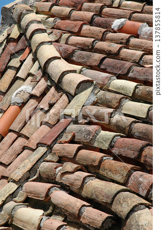 Old mediterranean clay tile roof texture Old mediterranean clay tile roof texture 137855814