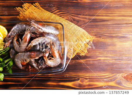 shrimps raw gambas seafood prawn healthy meal food snack on the table copy space food background rustic top view shrimps raw gambas seafood prawn healthy meal food snack on the table copy space food background rustic top view 137857249