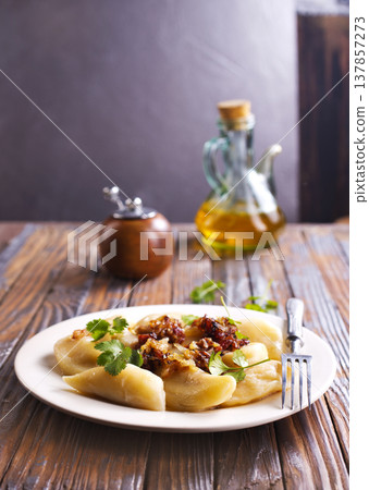 closeup of traditional ukrainian food - dumplings varenik closeup of traditional ukrainian food - dumplings varenik 137857273