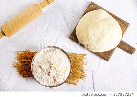 dought and ingredients, fresh dought on a table 137857284