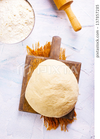 dought and ingredients, fresh dought on a table dought and ingredients, fresh dought on a table 137857285