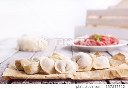 damplings with fresh meat and onion 137857312