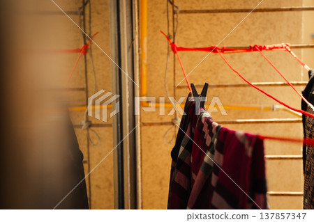 Laundry on the clothespin. Clothes drying on the sun Laundry on the clothespin. Clothes drying on the sun 137857347