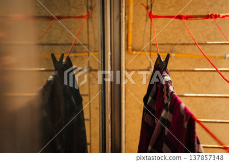 Laundry on the clothespin. Clothes drying on the sun Laundry on the clothespin. Clothes drying on the sun 137857348