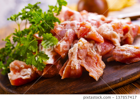 raw meat with spice on wooden board 137857417