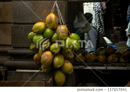 Streets of Colaba in Mumbai, India at evening time. Beautiful buildings in British style Streets of Colaba in Mumbai, India at evening time. Beautiful buildings in British style 137857841