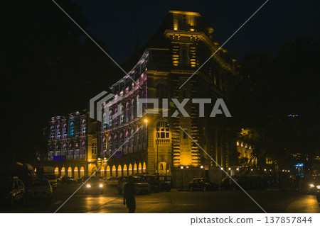 Streets of Colaba in Mumbai, India at evening time. Beautiful buildings in British style Streets of Colaba in Mumbai, India at evening time. Beautiful buildings in British style 137857844