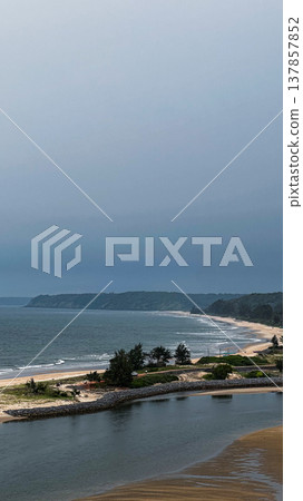 Redi Fort in Goa, India. Beautiful beach near the Indian ocean Redi Fort in Goa, India. Beautiful beach near the Indian ocean 137857852